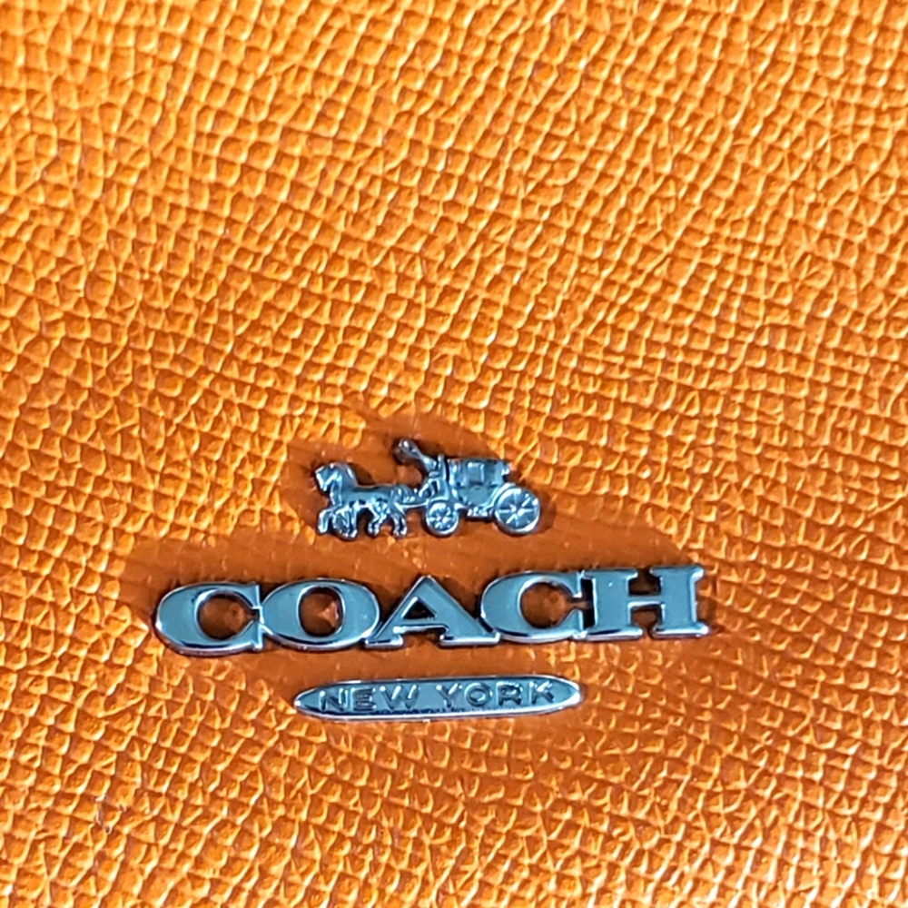 Coach Camera crossbody bag orange color